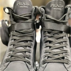 Mens Prada boots with detachable pouch.